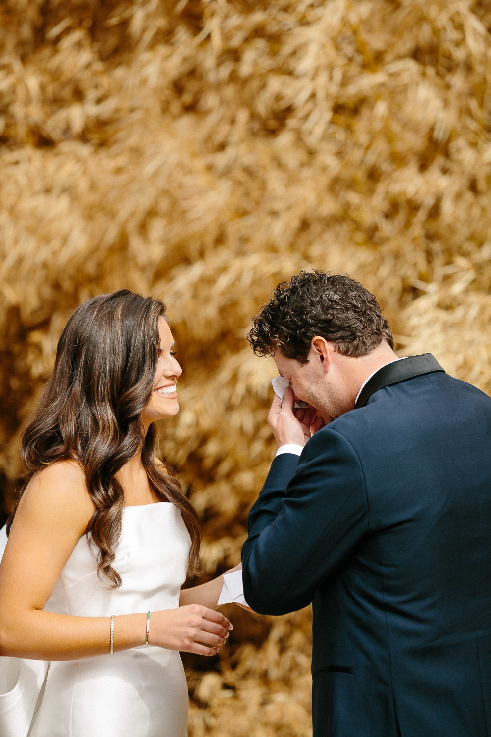 bride and groom seeing each other first time wedding look reaction in front of golden plants Austin