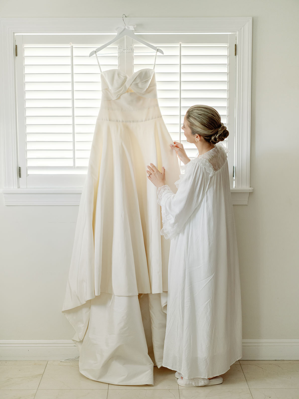 bride-holding-dress-3GF-W