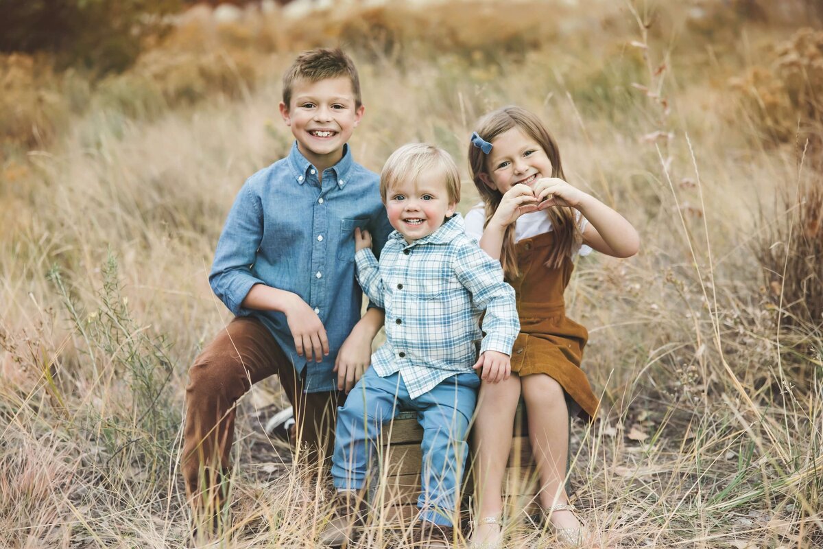 Children posed for family pictures in denver