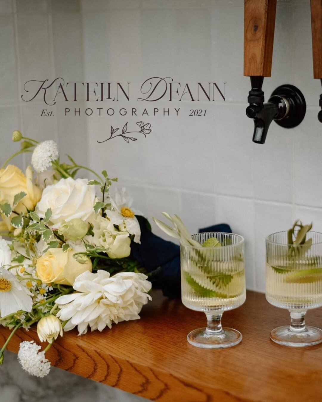 Bar top with taps and florals overlaid with a logo representing full service design and calligraphy by Life in Letters.