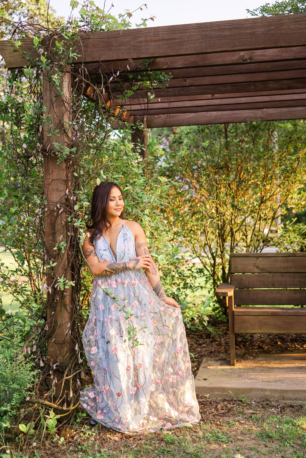 woman in beautiful pastel dress in the park