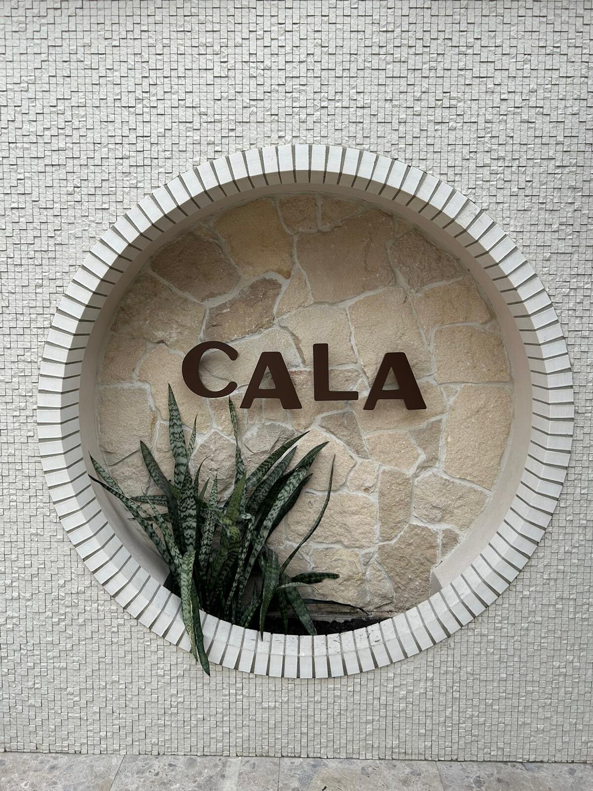 Cala metal sign