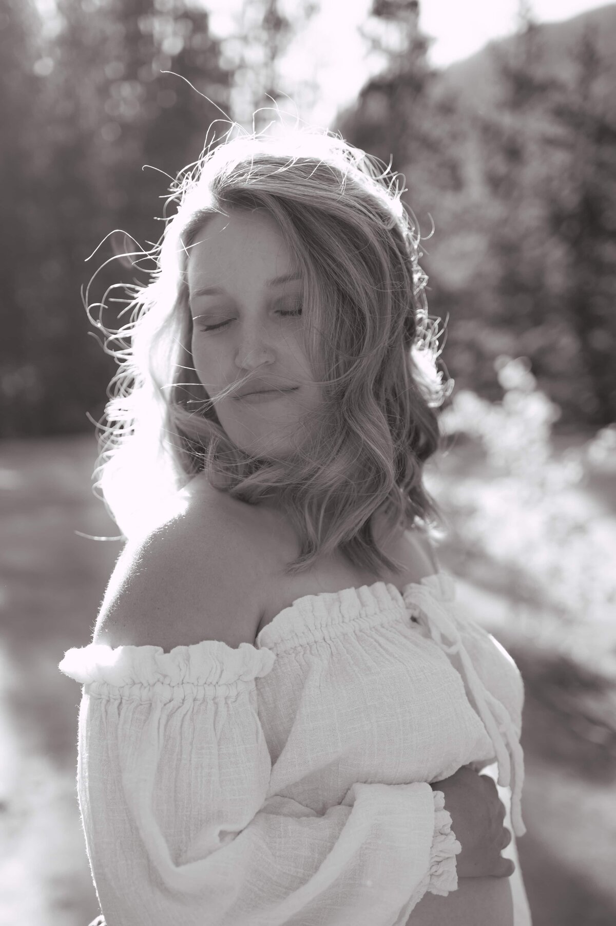Emotive black and white portrait edited with Slate Veil preset – heavy grain, low contrast, and raw film-inspired tones for timeless storytelling.
