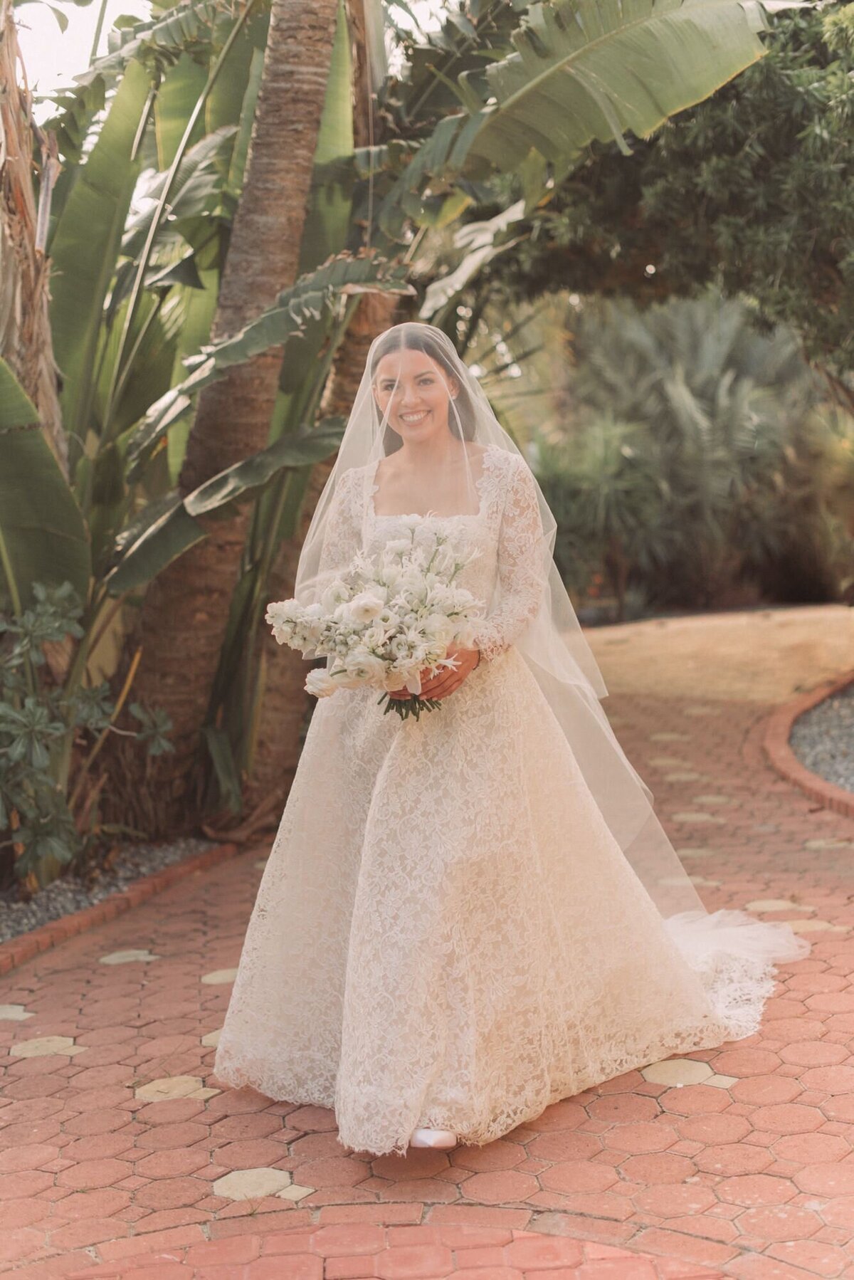 luxury bride in monique lhuillier designer bridal wear at exclusive luxury venue in aruba