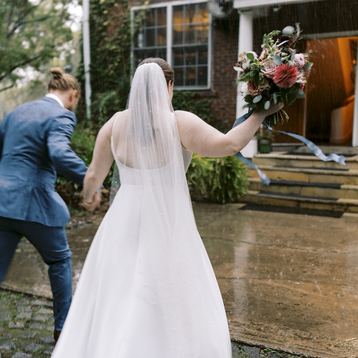 Outing lodge wedding in the rain in still water minnesota