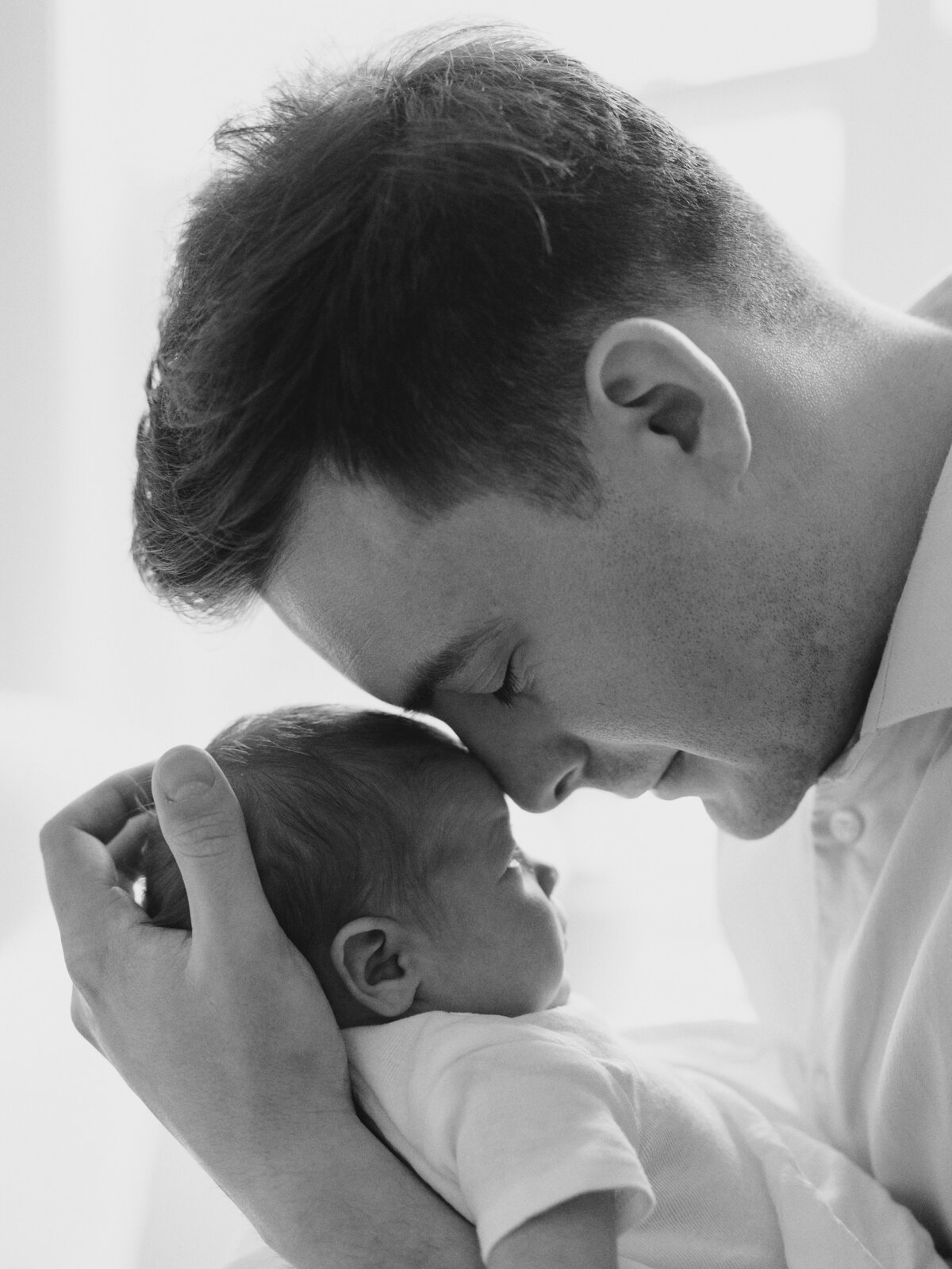 black and white. father daughter newborn photo
