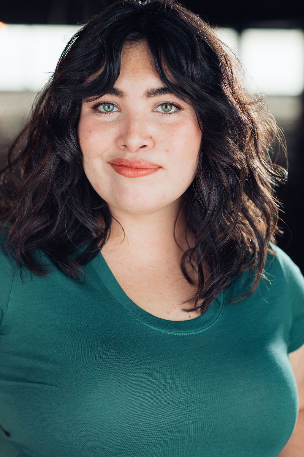 Headshot Photograph Of Young Woman In Blue Green Shirt Los Angeles