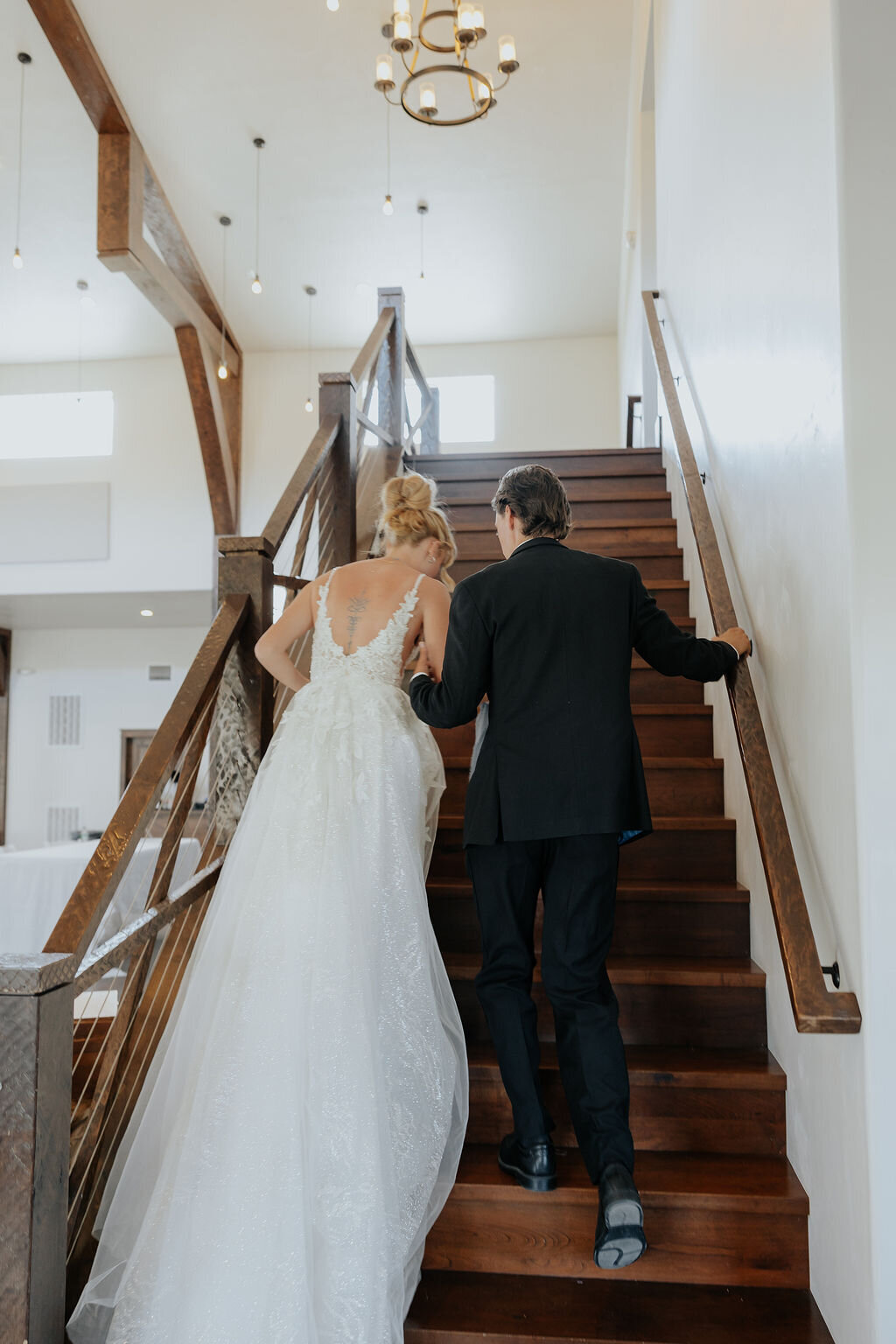 Couple climbing the grand staircase