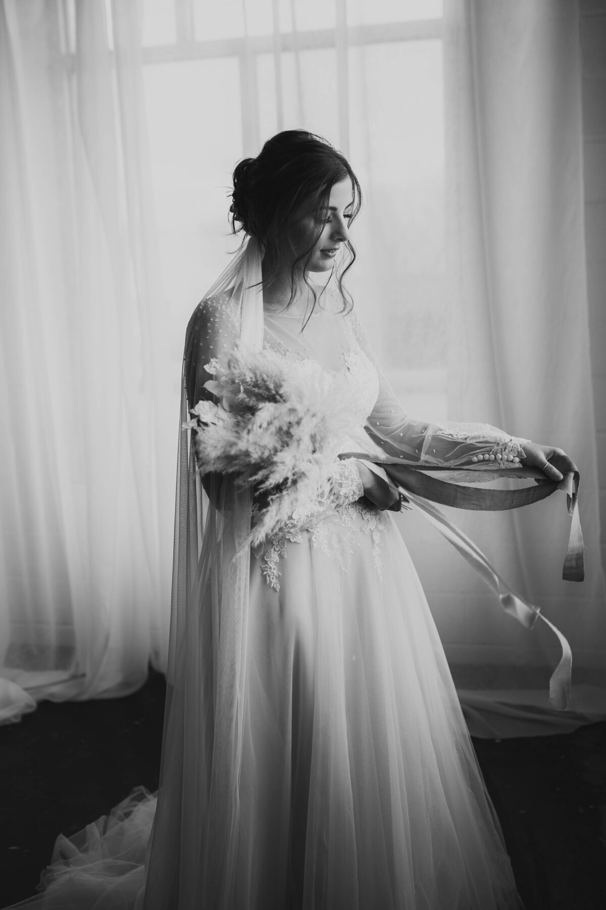black and white photo of romantic bride