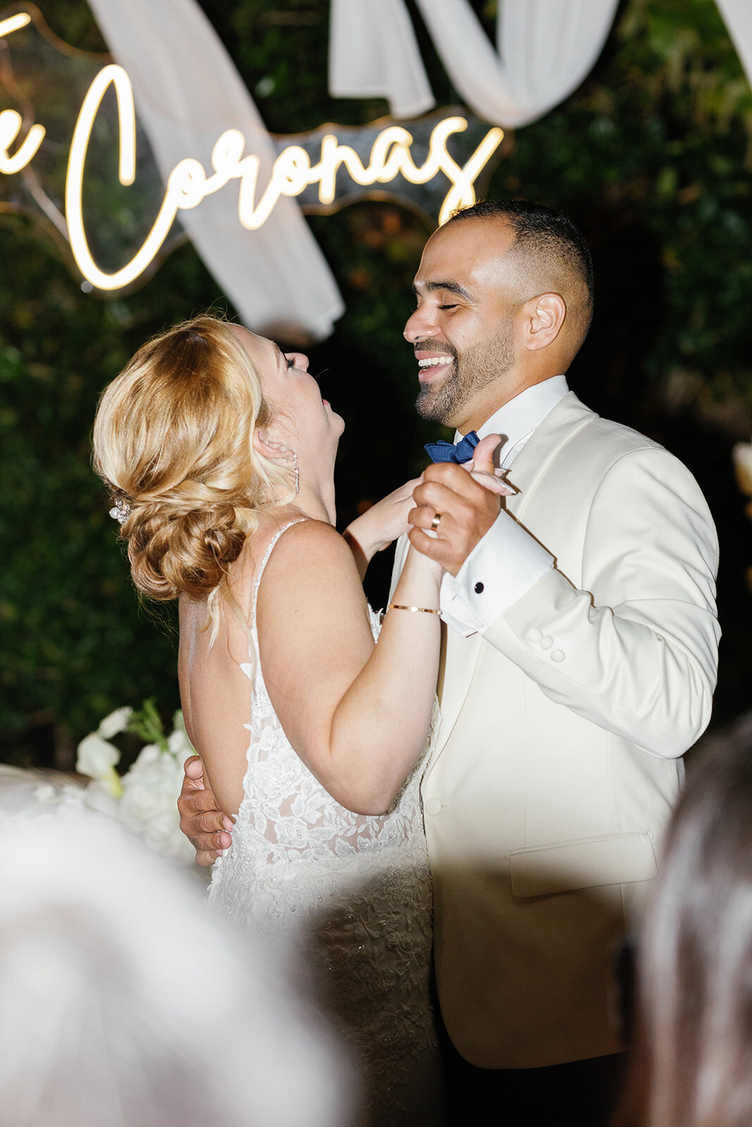 Kelly and Rafael’s joyful first dance under twinkling lights at their Islamorada wedding.