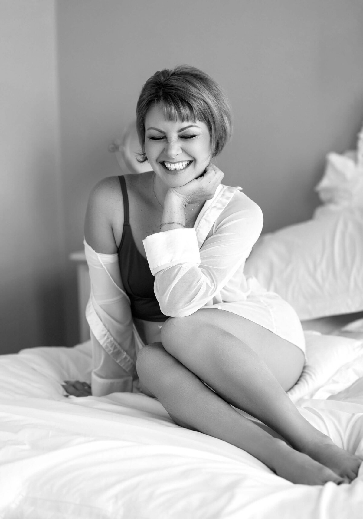 Striking black and white boudoir portrait with effortless beauty.