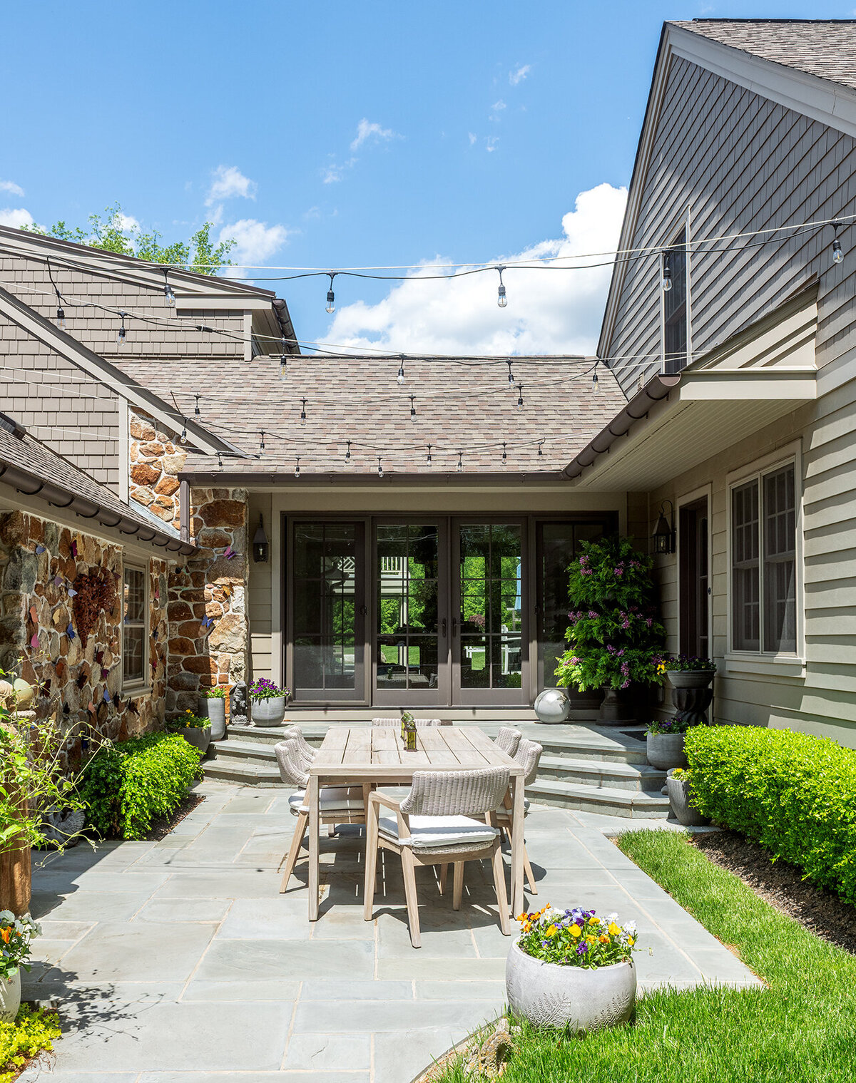 outdoor tan patio with dining set