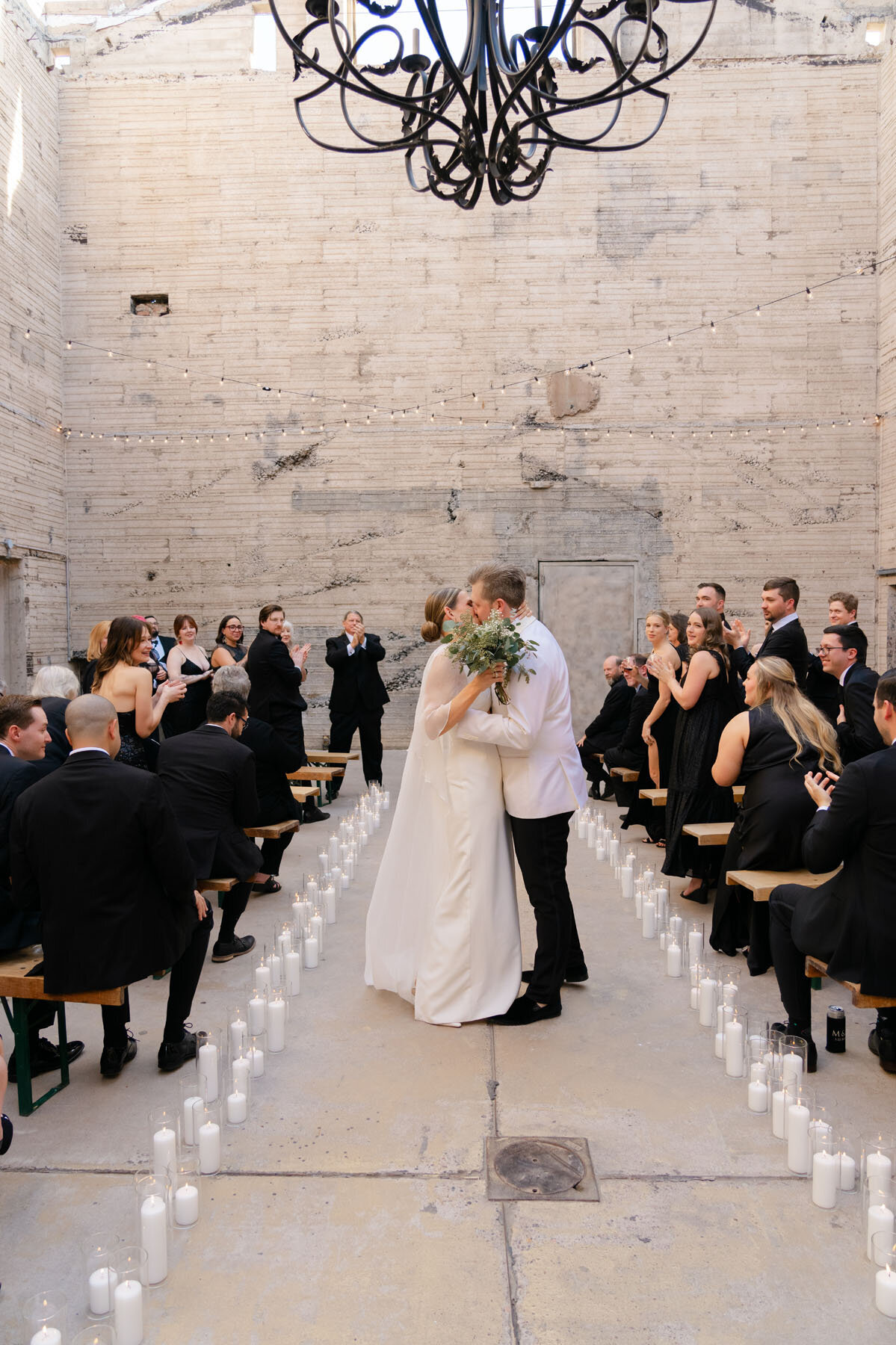 Luxury leaning Arizona wedding photo created in an industrial warehouse space.