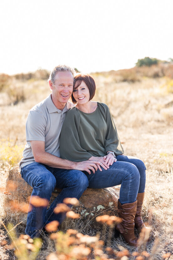 grandparents-sitting-on-rock-wrights-field-san-diego