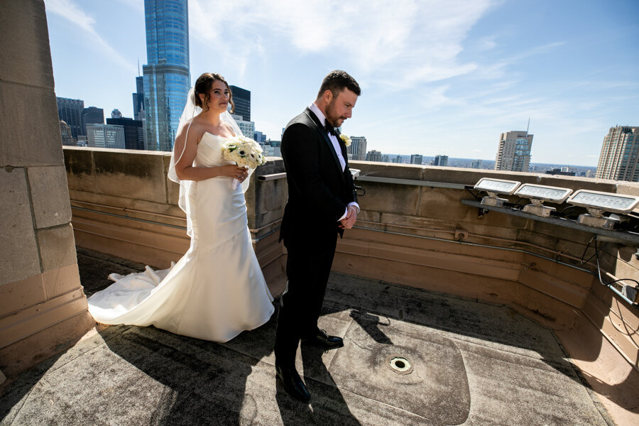 bride-walkup-first-look-intercon-hotel-rooftop