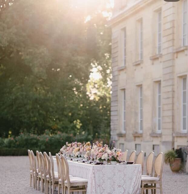 a classic and luxurious table set for a Catholic wedding reception in Italy