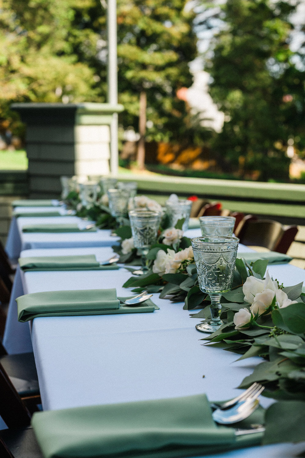 Outdoor wedding table reception setup with tablescpe