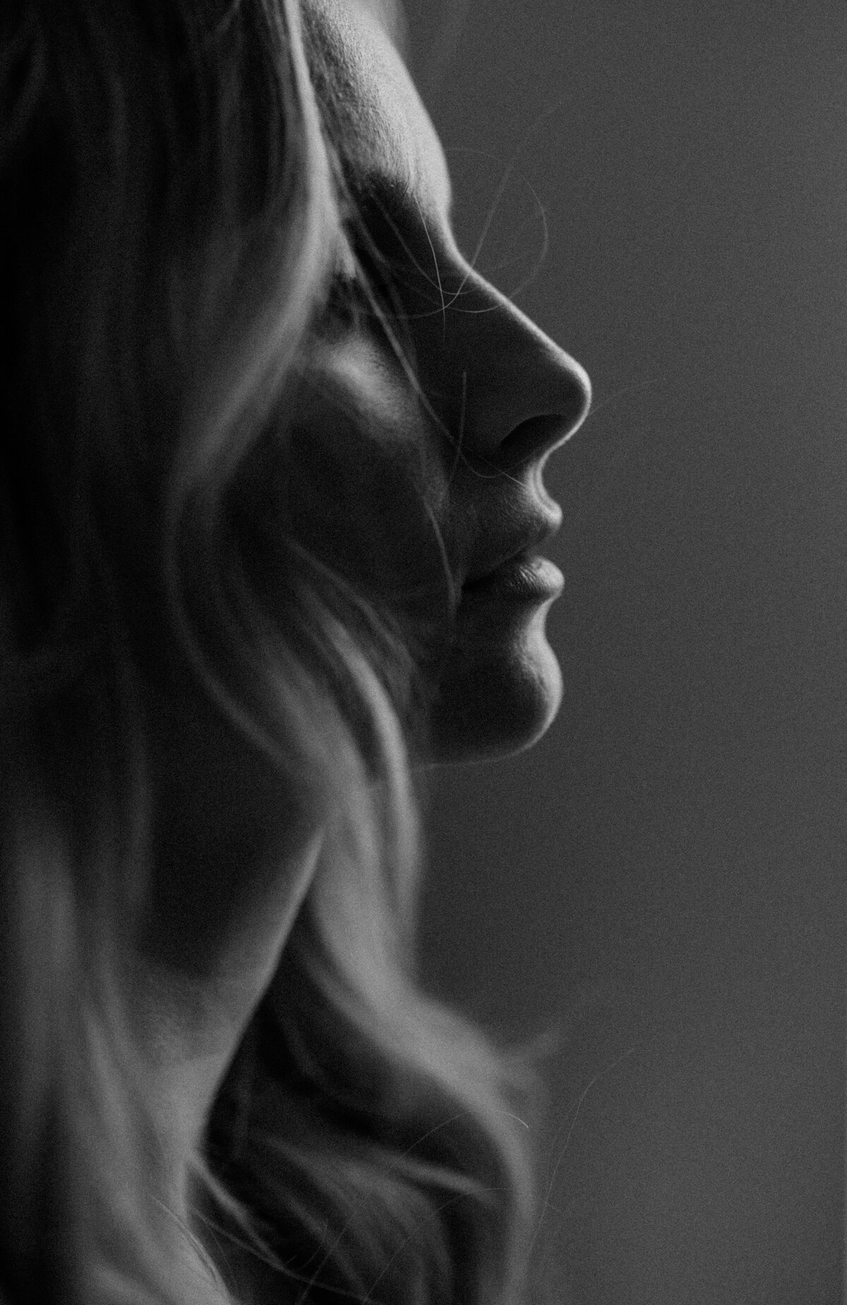 black and white image side profile of a woman