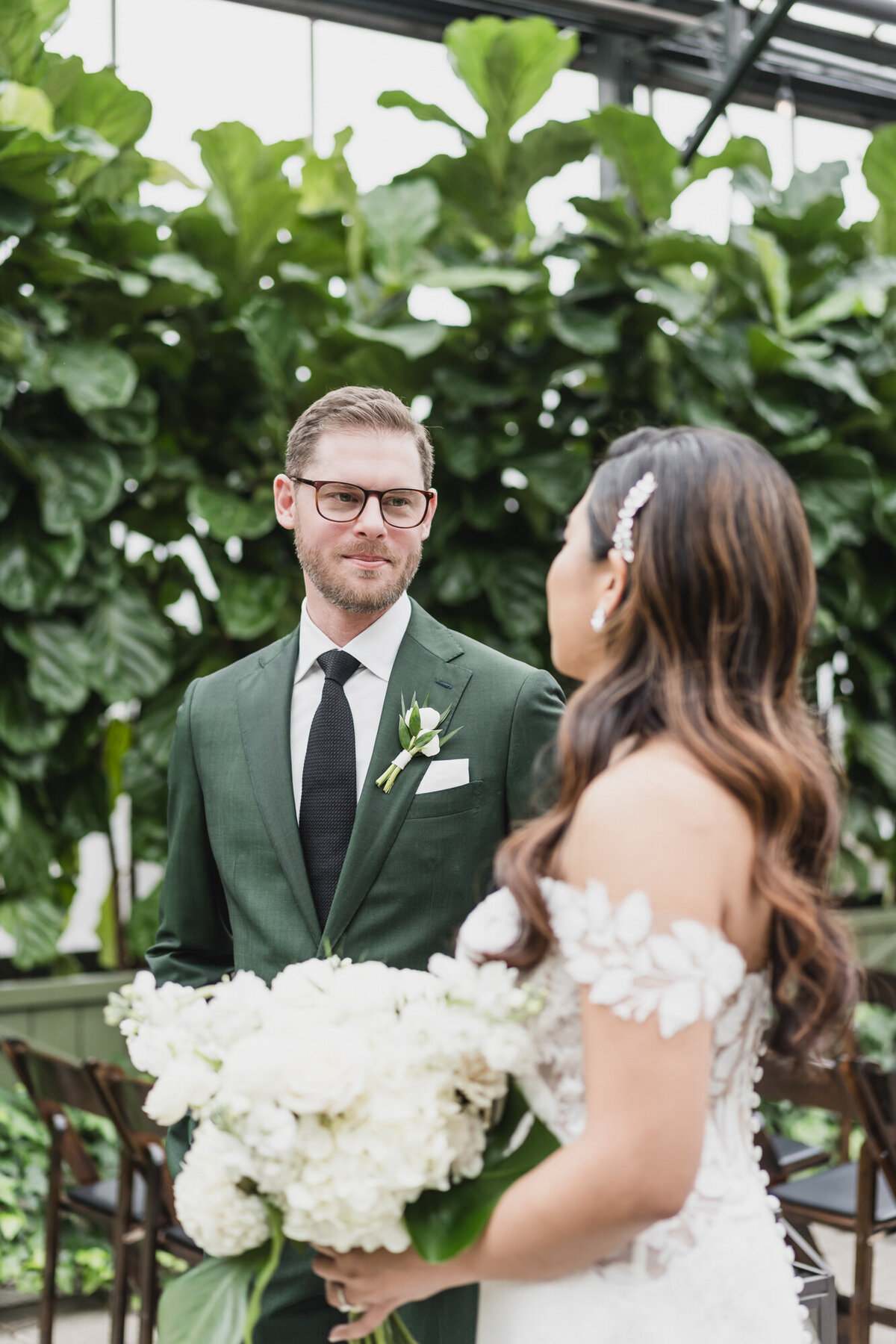 A MAGICAL WINTER PLANTERRA GARDEN WEDDING WITH A GREEN COLOR PALETTE IN WEST BLOOMFIELD, MICHIGAN PROVIDED BY KARI DAWSON PHOTOGRAPHY29