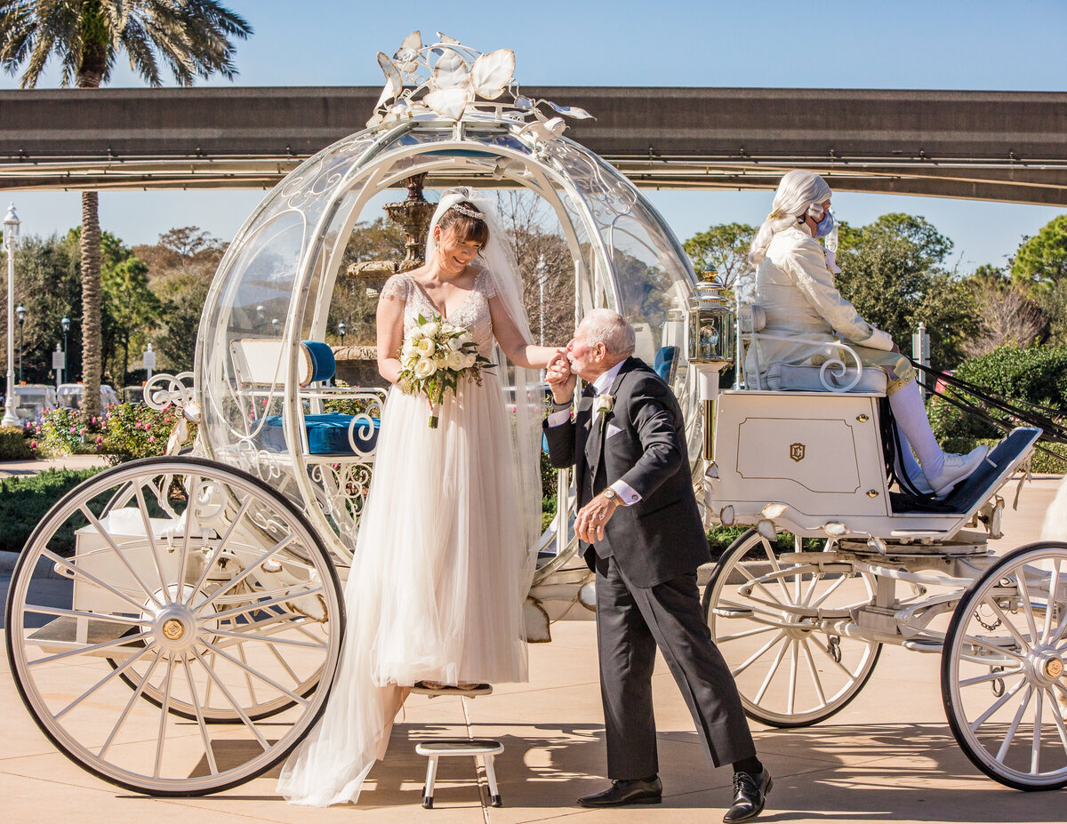 Bride exiting Disney Cinderella Carriage