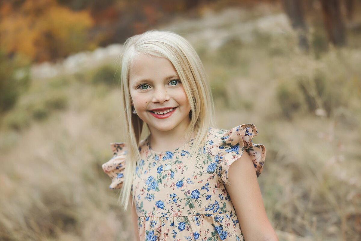 Little girl posed for family pictures