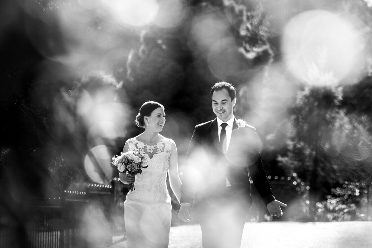 wedding couple walking in park