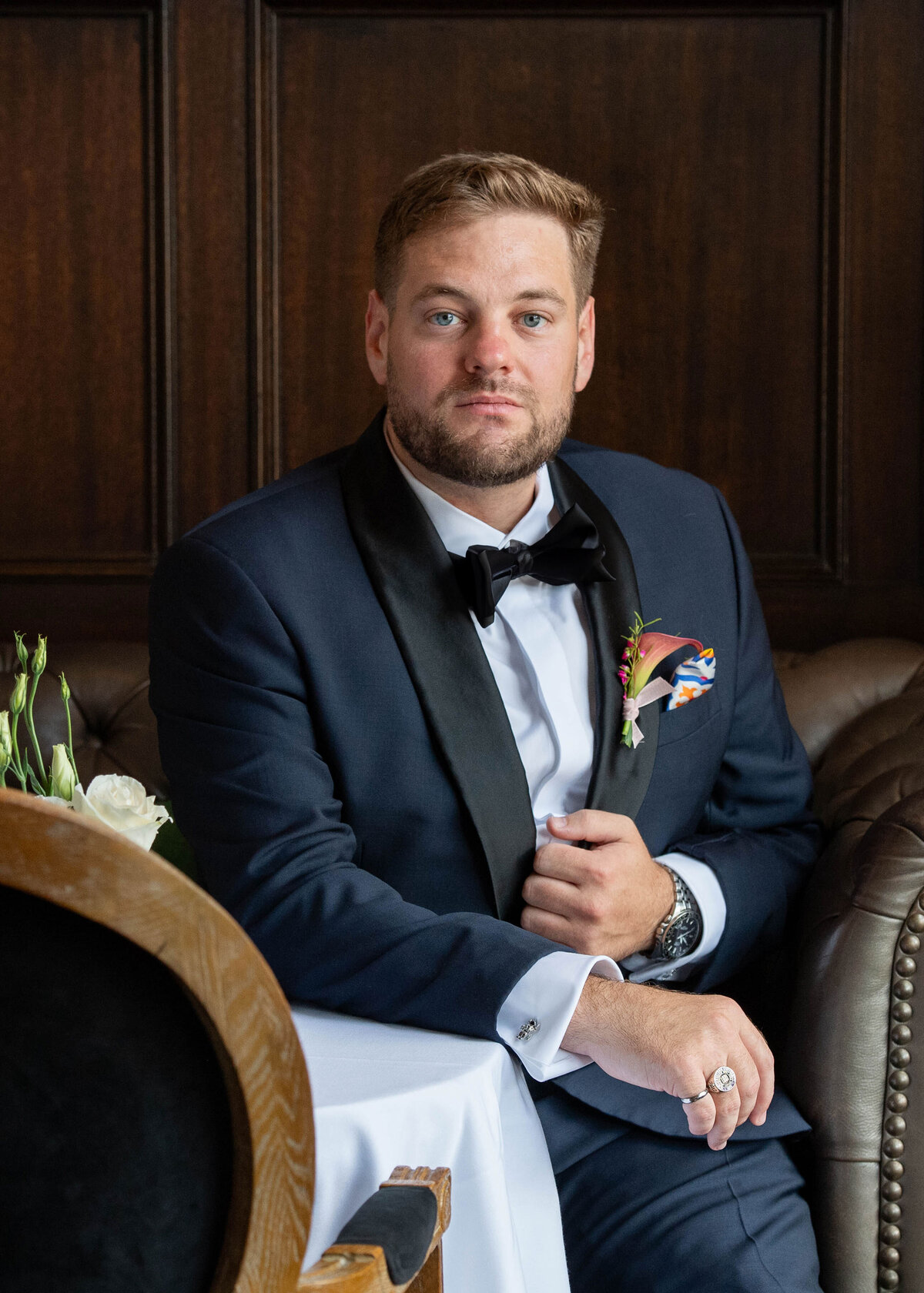 Groom posing for his photos