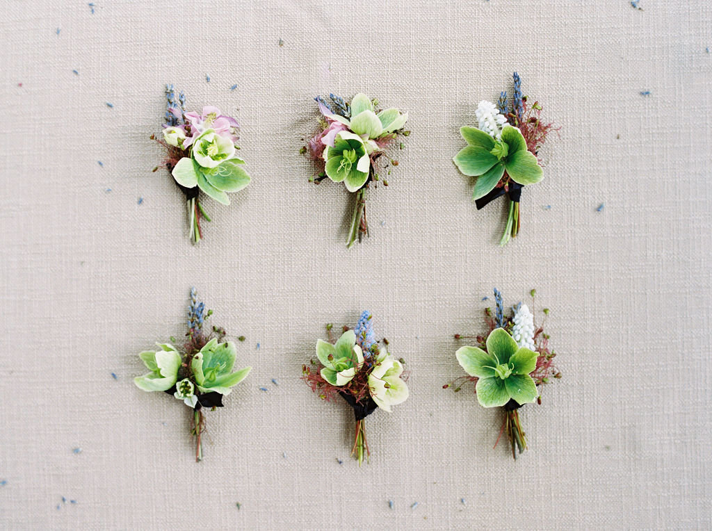 Boutonnieres filled with texture and spring blooms by Gradient and Hue