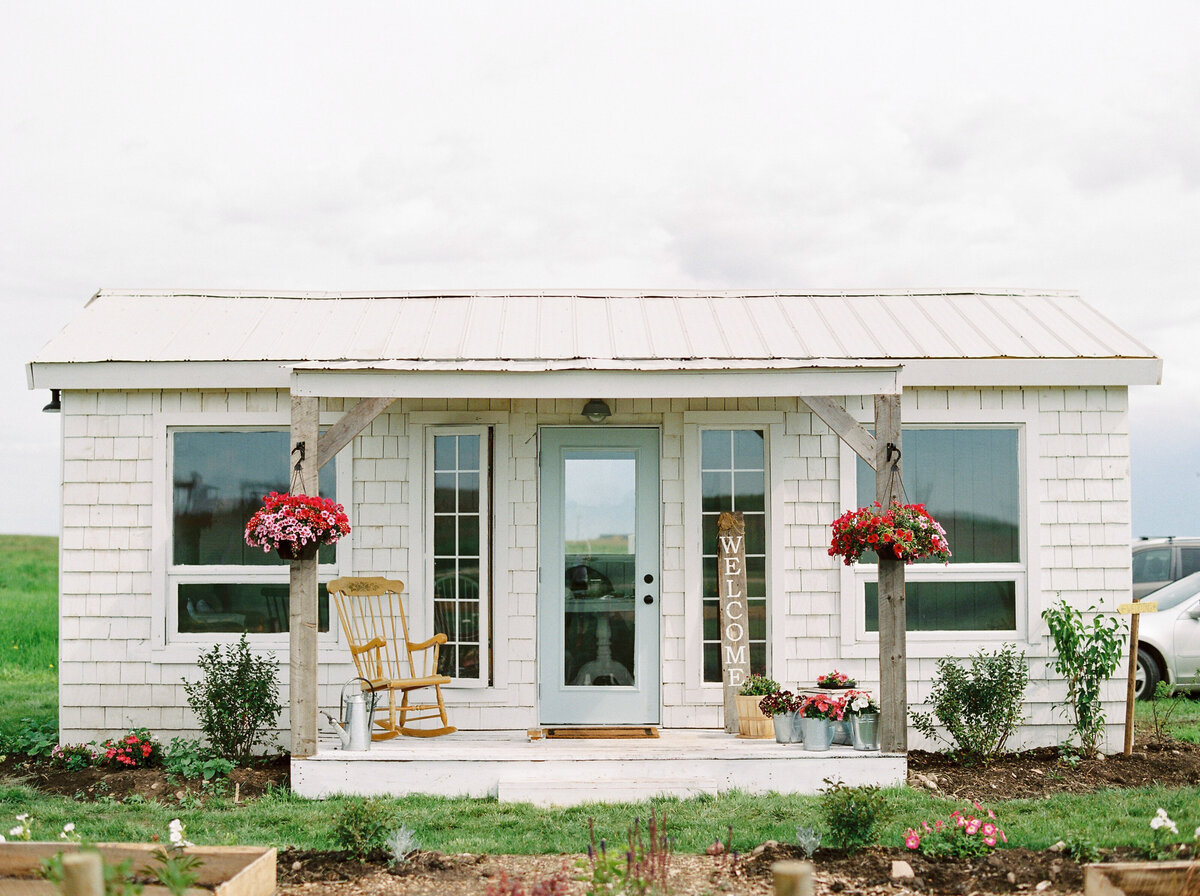 Bridal cottage suite at The Gathered, a nostalgic greenhouse based in Kathryn, Alberta wedding venue, featured on the Brontë Bride Vendor Guide.