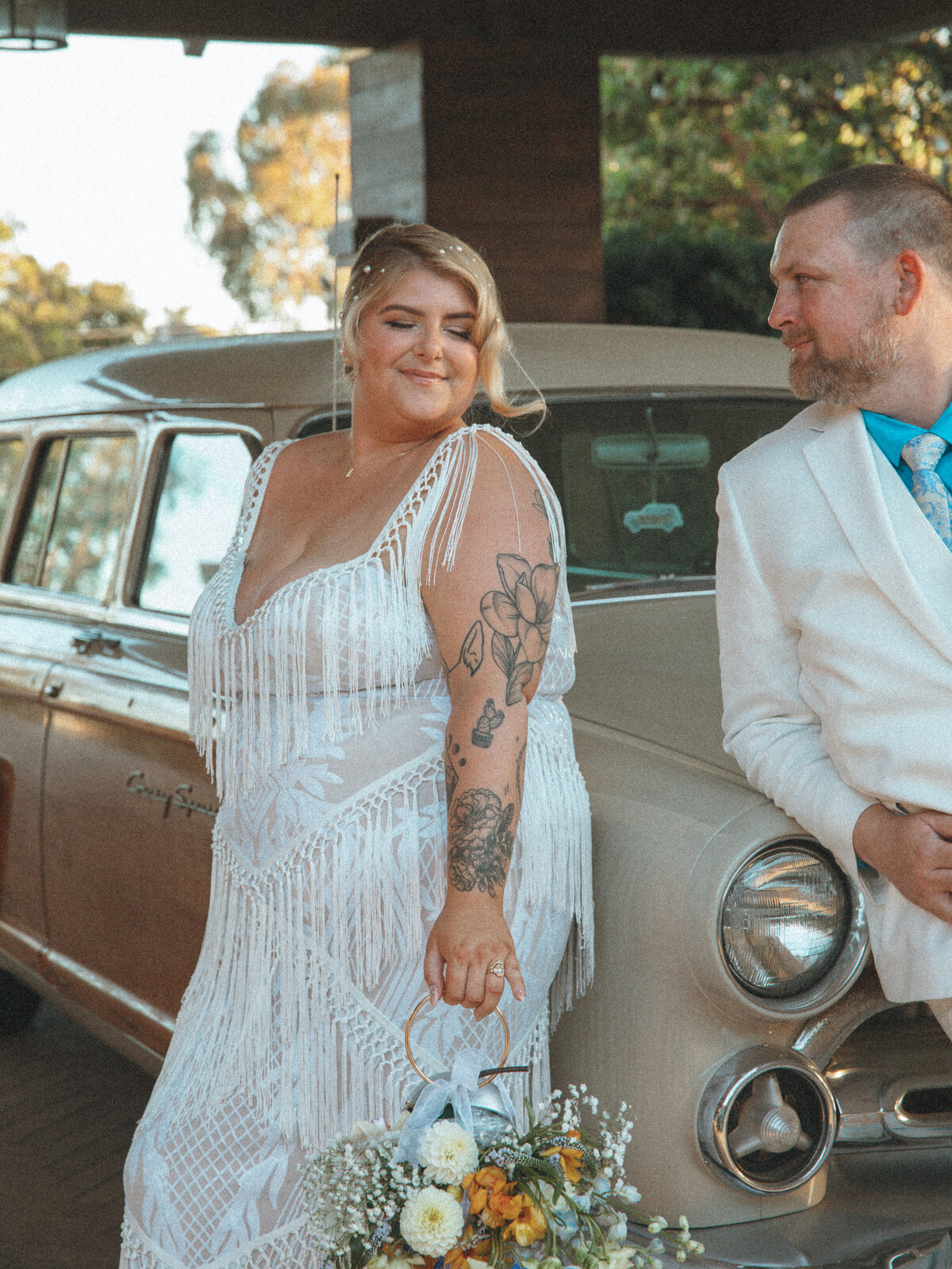 film edit bride and groom with classic car