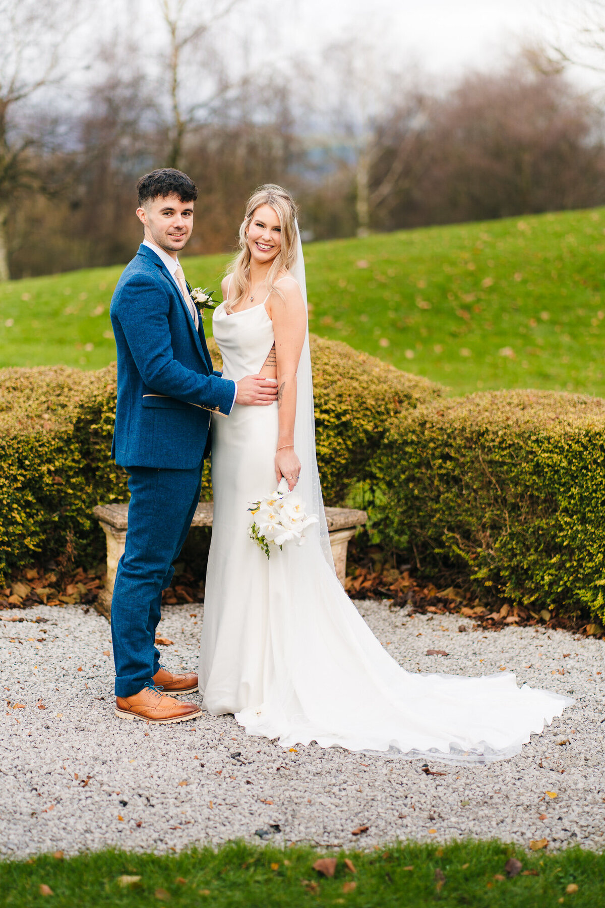 A beautiful picture of the bride and groom  in the gardens at Mytton fold Hotel taken by Anthony Horseman Wedding photographer