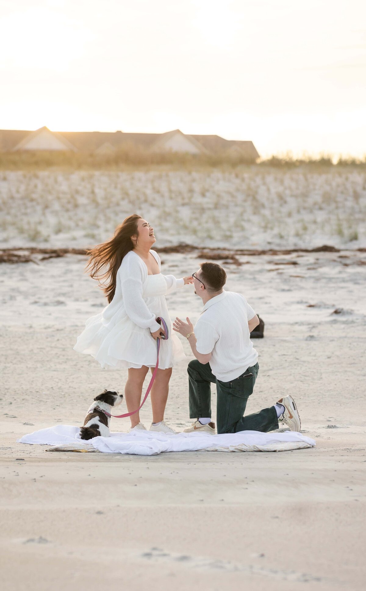 A surprise proposal during sunset on the beach