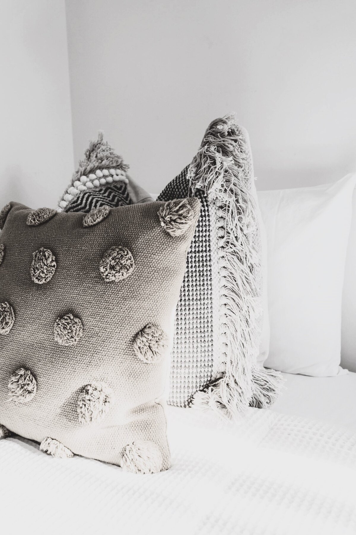 A set of textured throw pillows.