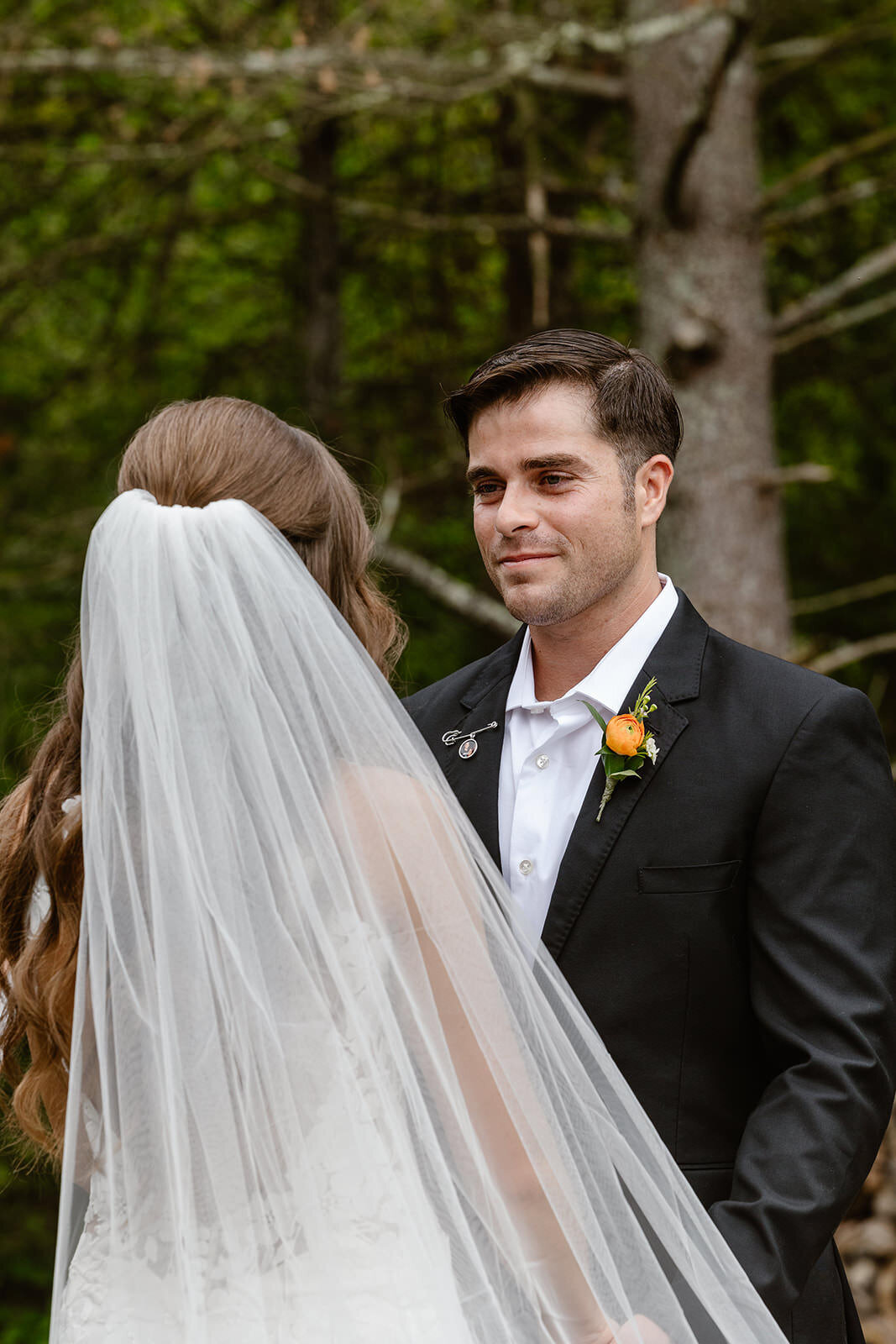 A couple standing up together during their wedding ceremony
