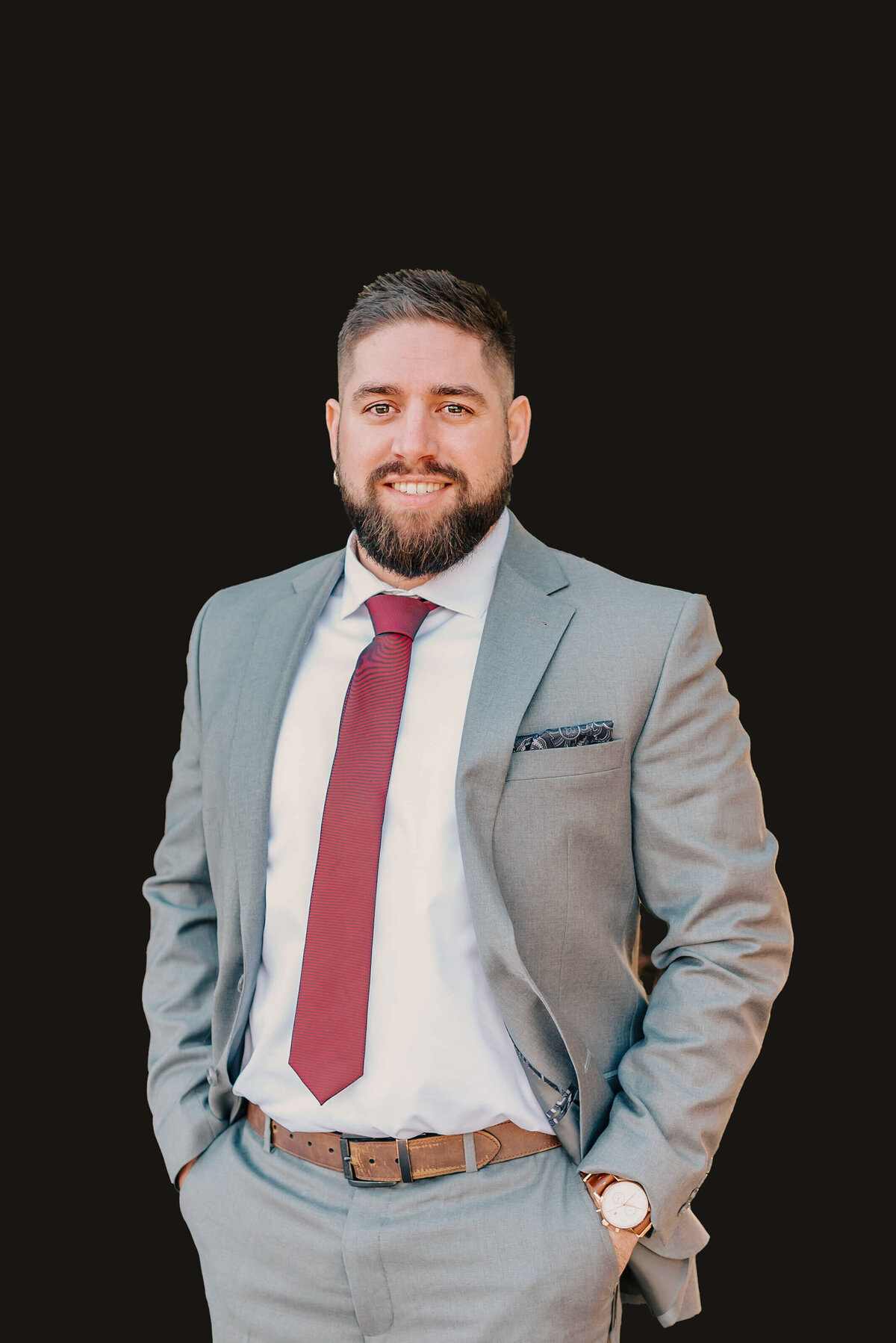 Springfield MO branding photographer captures man in grey suit smiling