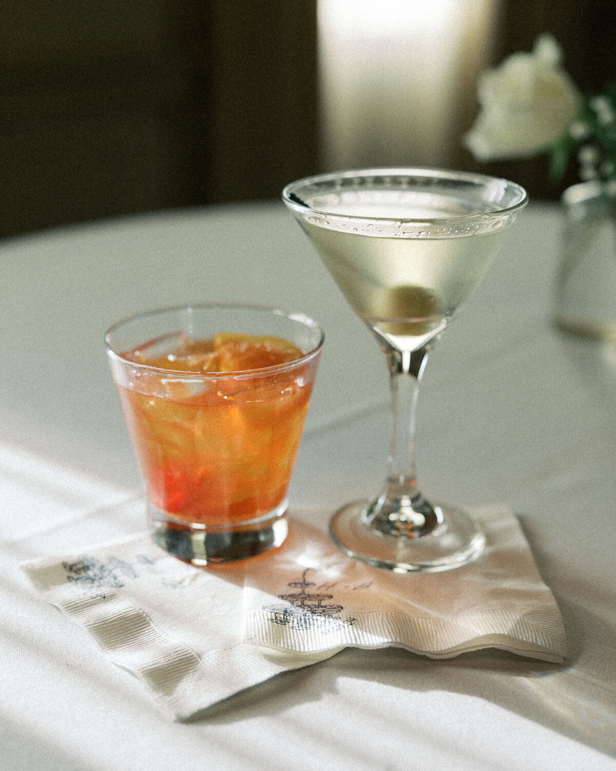 Wedding cocktails on monogrammed napkins captured by Philadelphia wedding photographer.