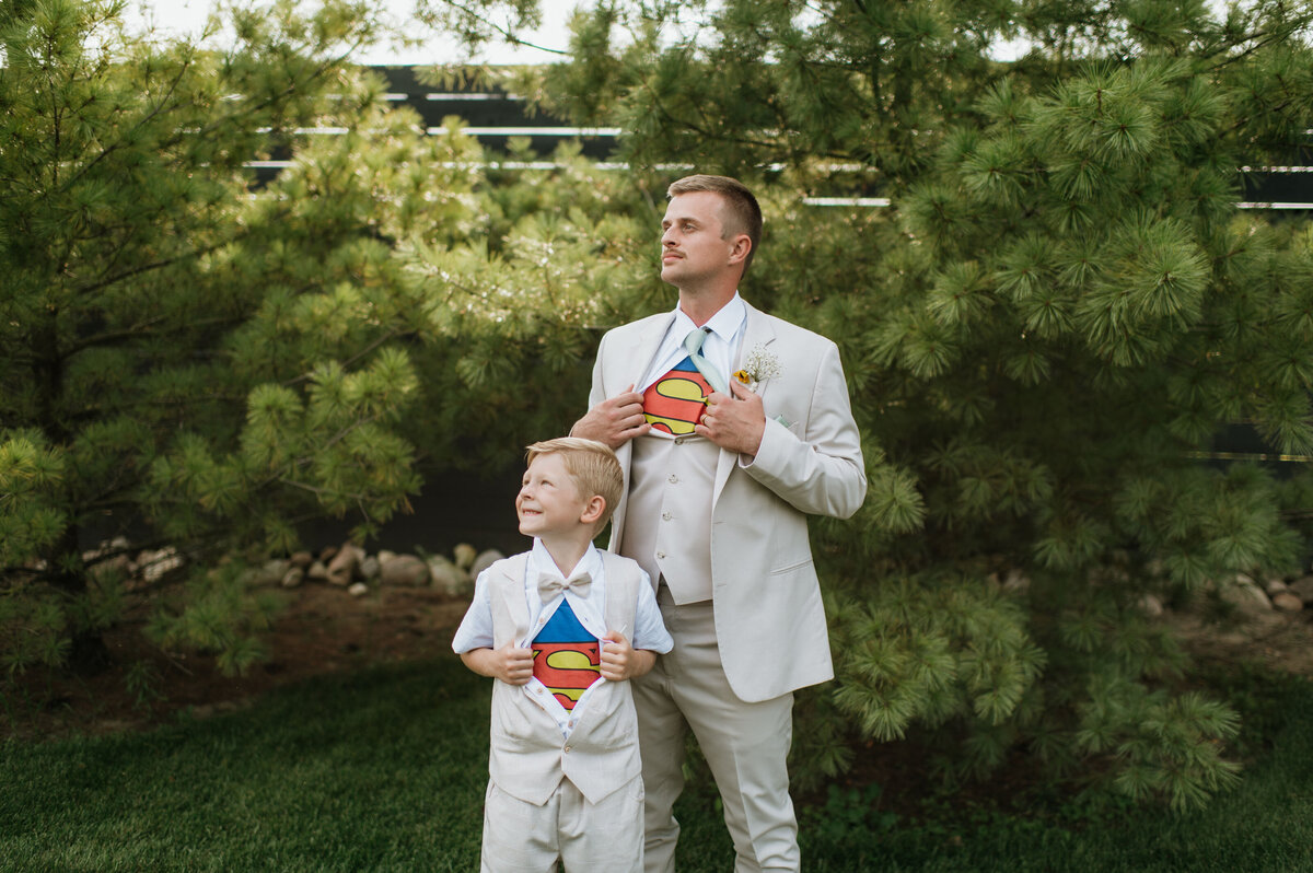 Father and Son with superman shirts at wedding in South Bend