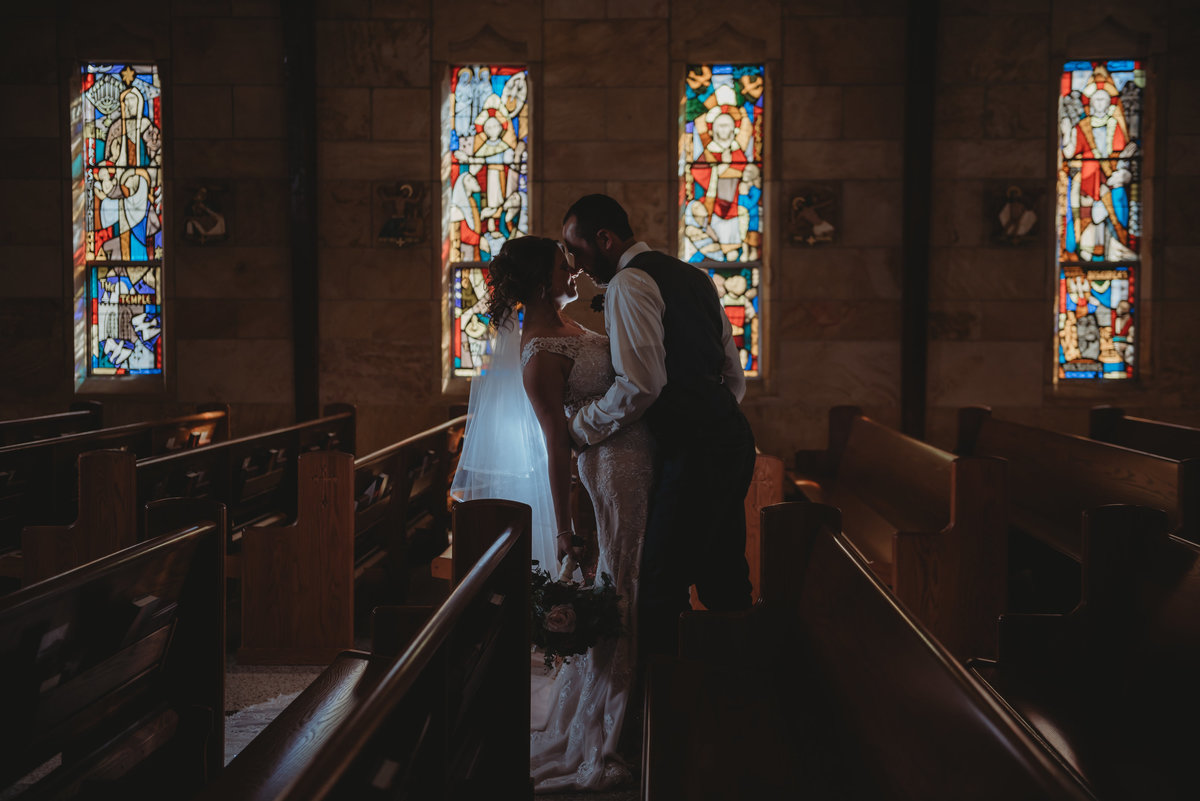wedding photographer stained glass evansville indiana
