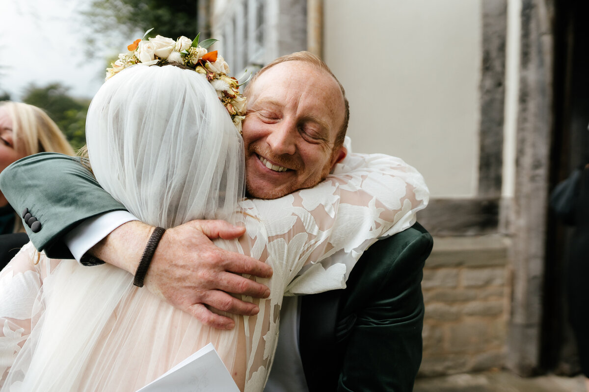 Wedding-Guest-Hugs-Bride