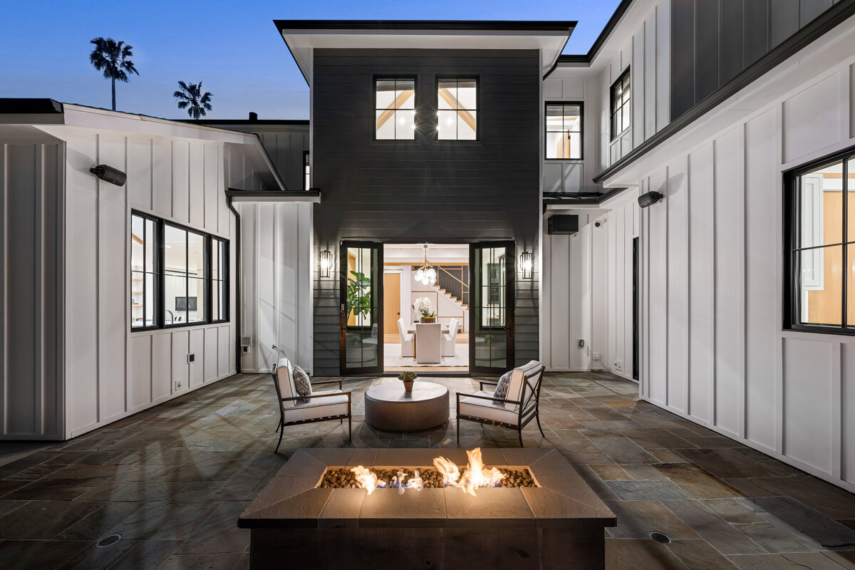 the-patio-features-a-fire-pit-with-glass-doors-and-2025-02-02-08-03-44-utc