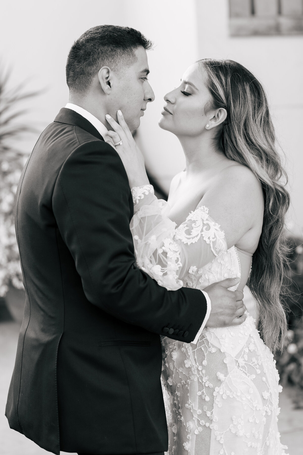 Black and white photo of a couple hugging