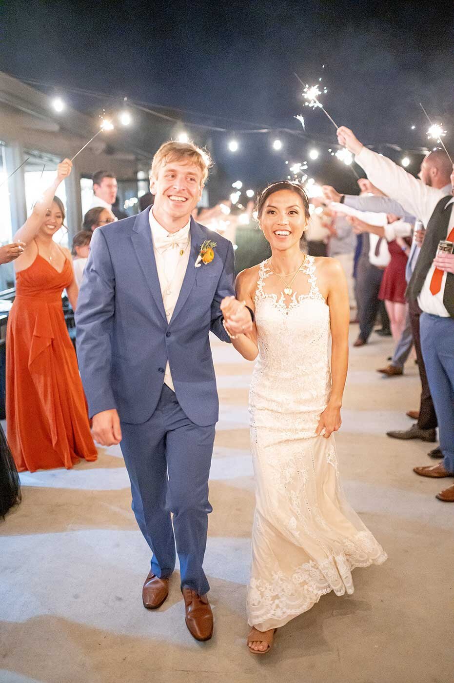 Sparkler wedding send off with bride and groom