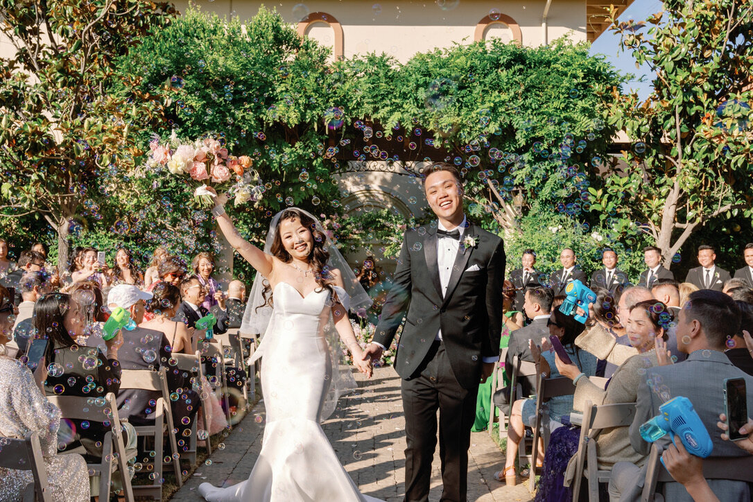 bride and groom, bubble exit, pastel flowers