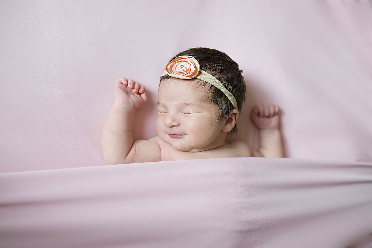 pink flower headband for sweet baby newborn photography in home