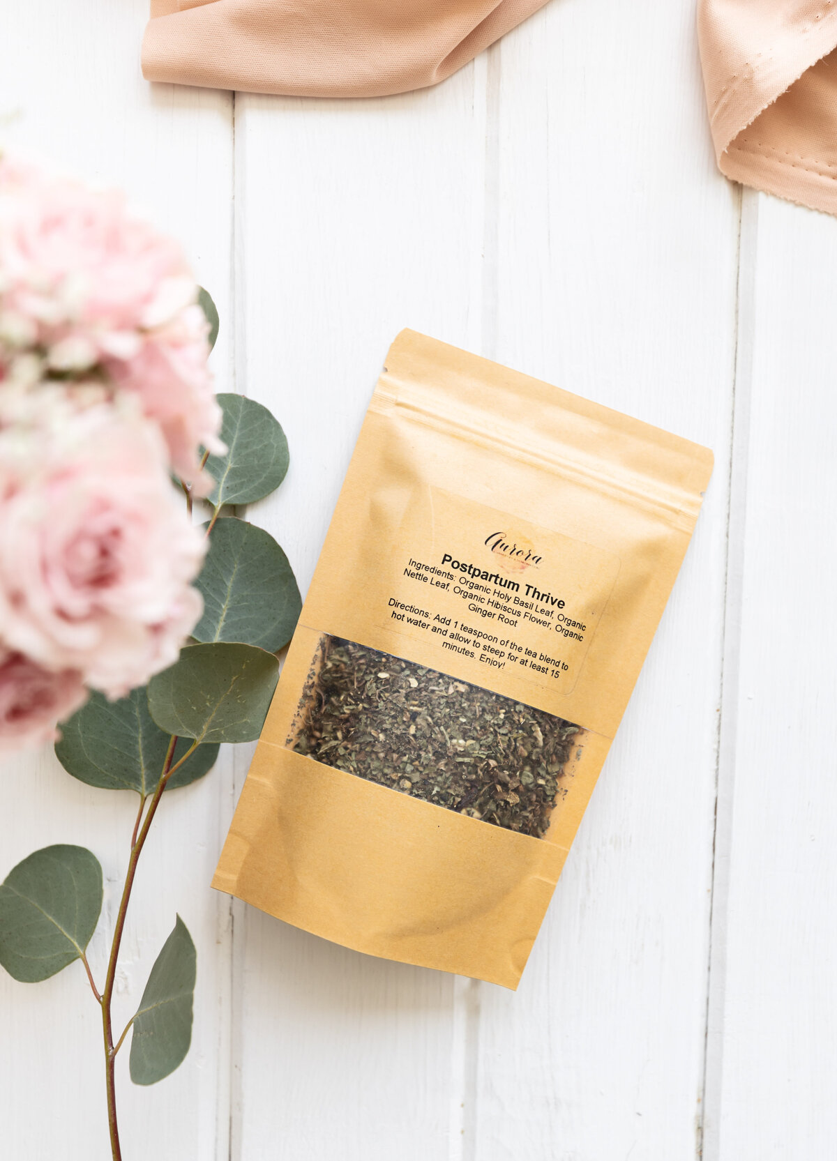 Dried postpartum tea in a bag