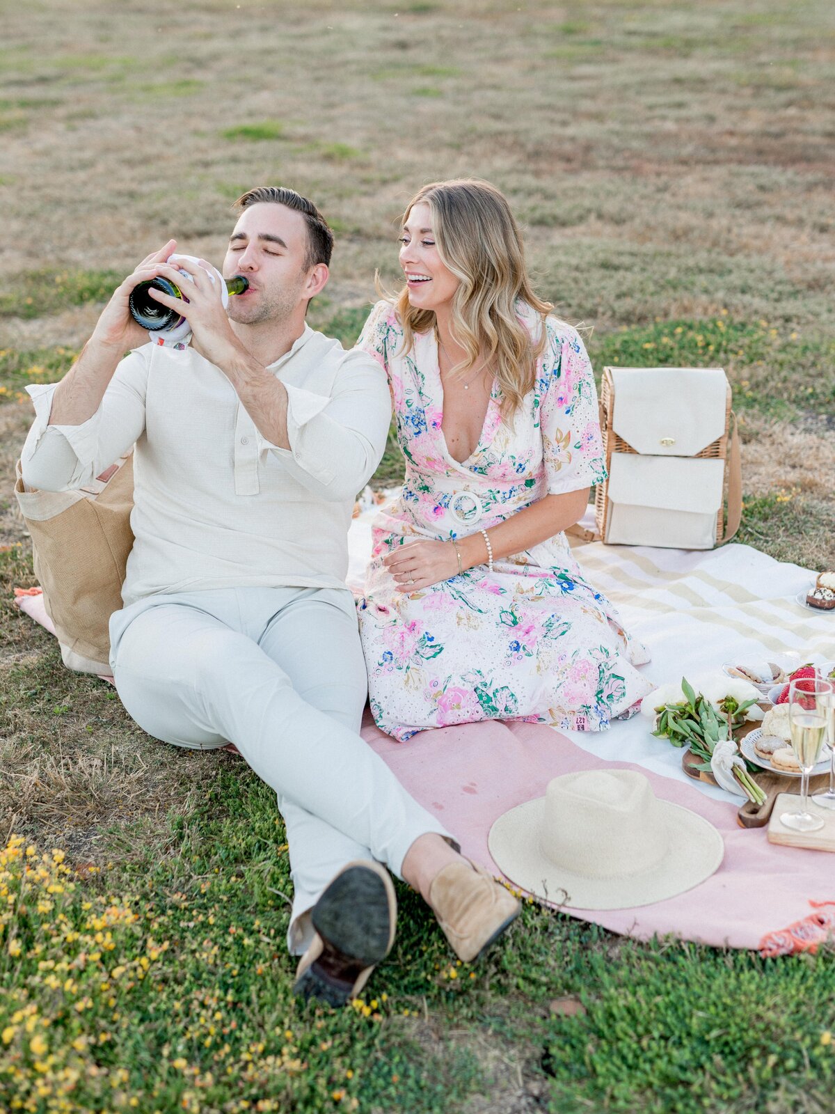 A fun and light engagement photos in a picnic setting captured by Leana Myra Photography