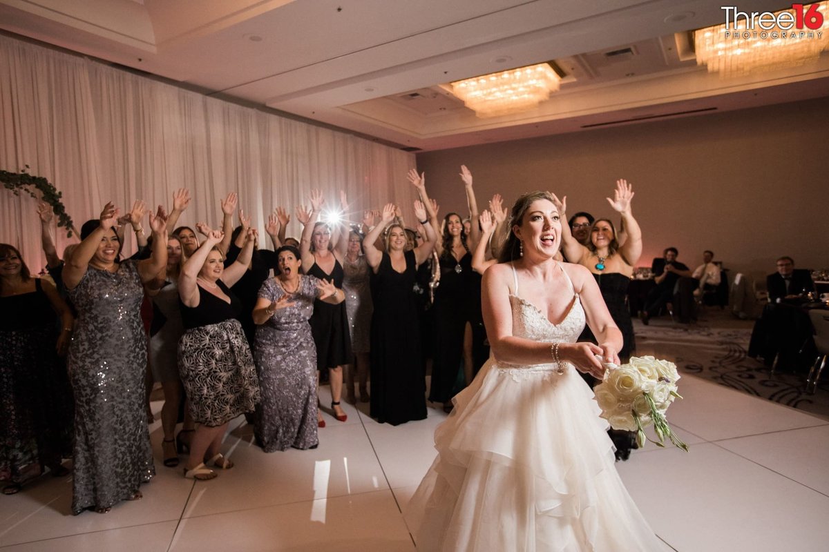 Bride set to toss the bouquet