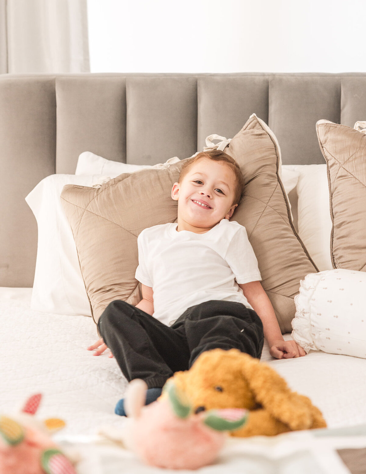 In-home lifestyle family session with mom, dad, toddler, and newborn in Orlando Florida home

