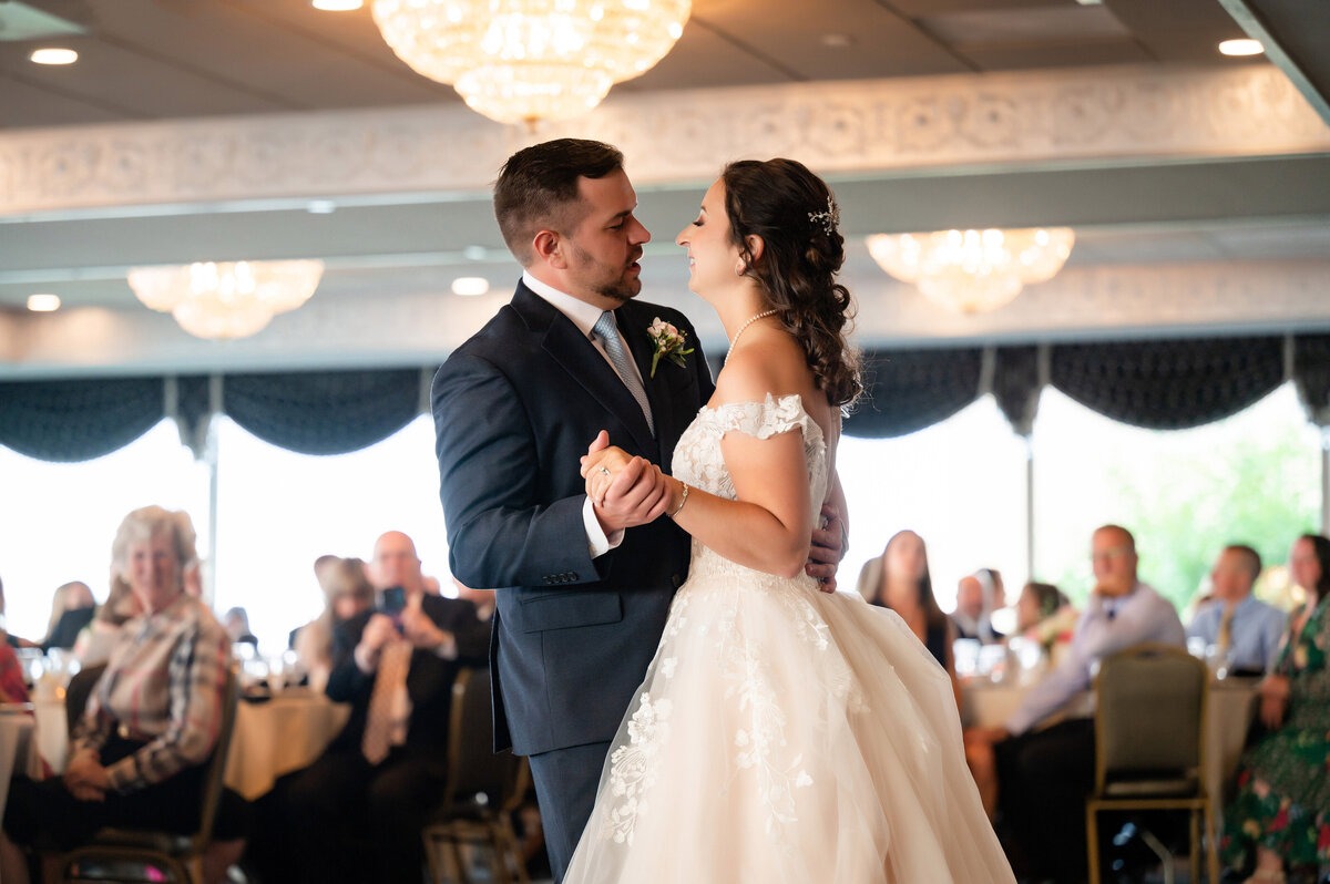 couple having their first dance in their wedding reception at the lemont restaurant