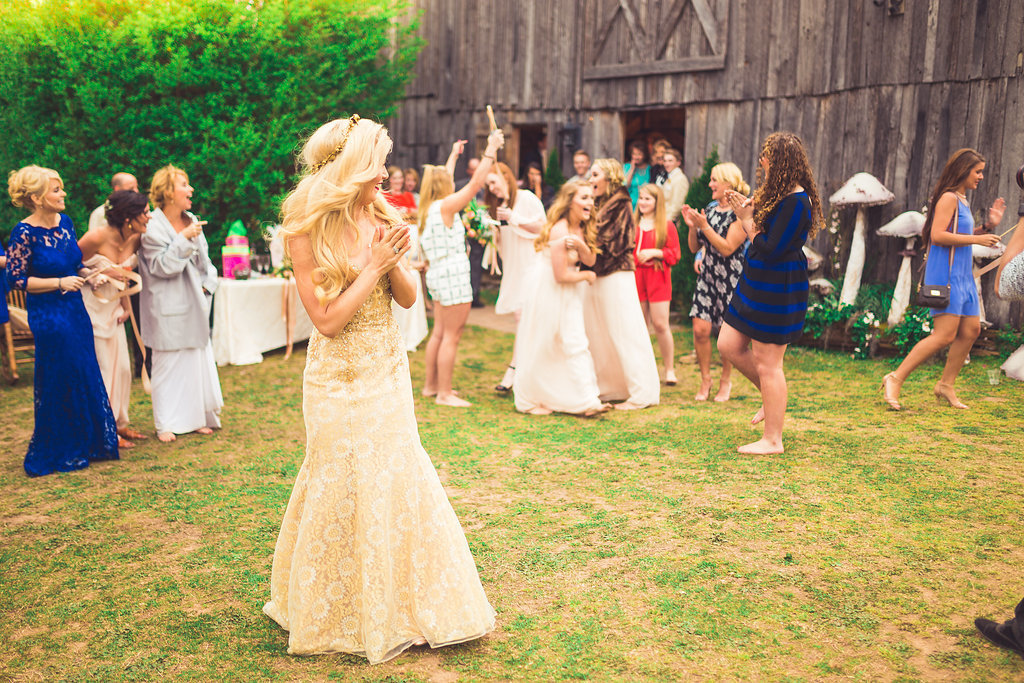 Wedding Photograph Of Women Catching the Wedding Bouquet Los Angeles